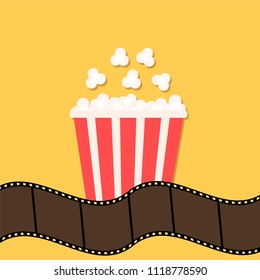 Popcorn. Film strip border. Red yellow box. Cinema movie night icon in flat design style. Stock vector illustration