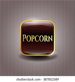 Emblema de oro de palomitas