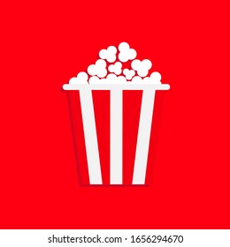 Popcorn icon. Cinema movie night. Big size strip box. Pop corn food. Cute package. Flat design style. Isolated. Red background. Vector illustration