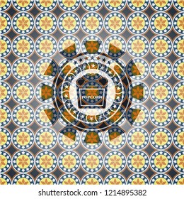 popcorn icon inside arabesque badge. arabic decoration.