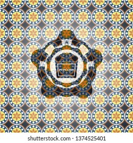 popcorn icon inside arabic emblem background. Arabesque decoration.