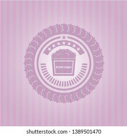popcorn icon inside badge with pink background