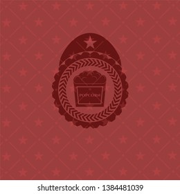 popcorn icon inside badge with red background