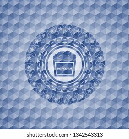 popcorn icon inside blue badge with geometric pattern.