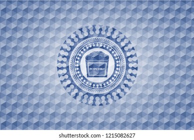 popcorn icon inside blue polygonal emblem.