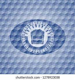 popcorn icon inside blue polygonal emblem.