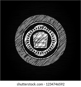 popcorn icon inside chalkboard emblem written on a blackboard