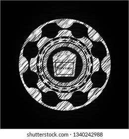 popcorn icon inside chalkboard emblem on black board