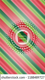 popcorn icon inside christmas badge background.