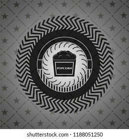 popcorn icon inside dark badge or emblem