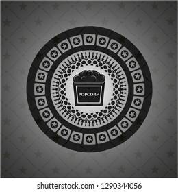 popcorn icon inside dark badge