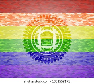 popcorn icon inside emblem on mosaic background with the colors of the LGBT flag