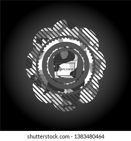 popcorn icon inside grey camo emblem