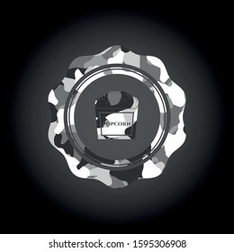 popcorn icon inside grey camouflaged emblem