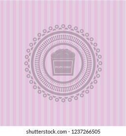 popcorn icon inside pink emblem. Retro