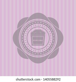 popcorn icon inside pink emblem. Vintage.