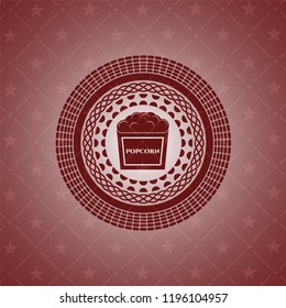 popcorn icon inside realistic red emblem