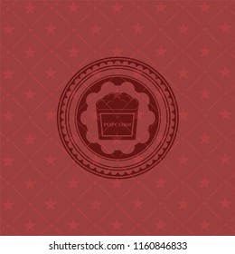 popcorn icon inside red icon or emblem