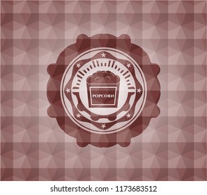popcorn icon inside red emblem with geometric pattern. Seamless.