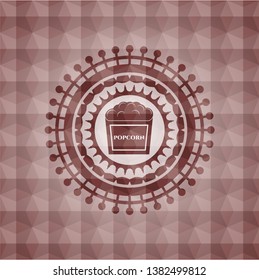 popcorn icon inside red emblem with geometric pattern background. Seamless.