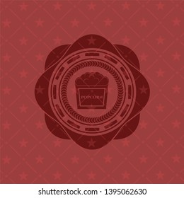 popcorn icon inside red icon or emblem