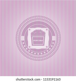 popcorn icon inside retro style pink emblem