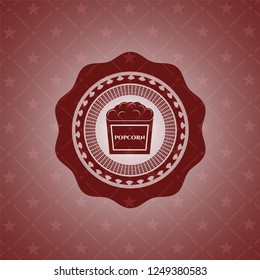 popcorn icon inside retro style red emblem
