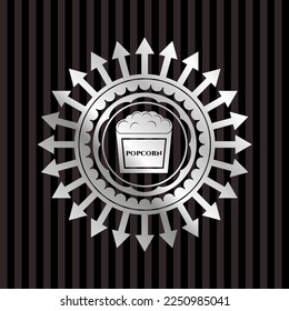 popcorn icon inside silvery shiny emblem. 