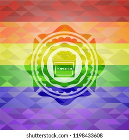 popcorn icon on mosaic background with the colors of the LGBT flag