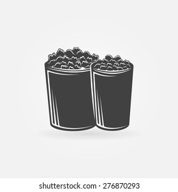 Popcorn icon or symbol - vector black and white logo