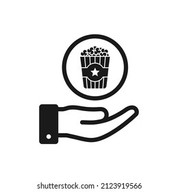 Popcorn on hand icon design isolated. Vector illustration