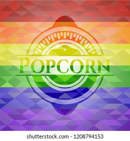 Popcorn on mosaic background with the colors of the LGBT flag