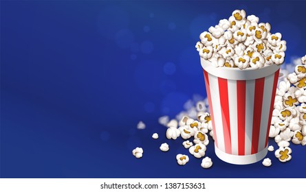 Popcorn in paper cup bucket. Online banner template, poster concept with copyspace, place for text. Snacks in movie theater. Fast food for cinema. Realistic blue background. Vector illustration.