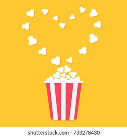 Popcorn popping. Heart shape frame. Red yellow strip box. Cinema movie night icon in flat design style. Yellow background. Isolated. Vector illustration