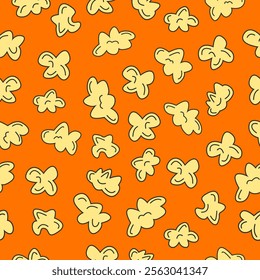 Popcorn seamless pattern on orange background. Popcorn motif cute cartoon doodle style. Vector illustration