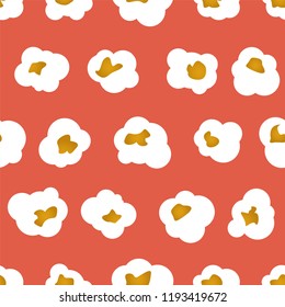 Popcorn seamless pattern on red background. Vector illustration.