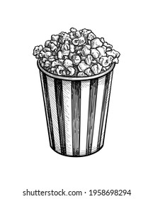 Popcorn in a striped cup. Ink sketch isolated on white background. Hand drawn vector illustration. Retro style.