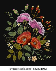Poppies and flowers embroidery on black background. Elegant flowers poppy and tropical flowers vector. Decorative floral embroidery,  template for design of clothes, t-shirt design 