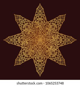 Popular decorative motif in South Eastern Asia. Intricate star shaped ornament. Hand drawing. Golden mandala Isolated on black background. EPS10 vector illustration