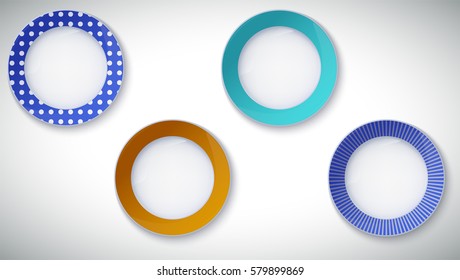 Porcelain plates with reflexes and reflections on white background, closeup. Several plates with various coloring and pattern