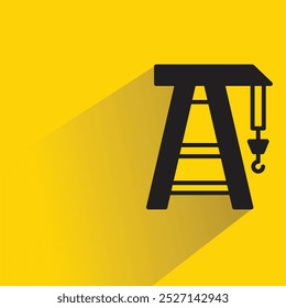 ícone de guindaste de porta com sombra no plano de fundo amarelo