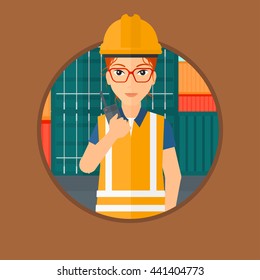 Port worker talking on wireless radio. Port worker standing on cargo containers background. Port worker using wireless radio. Vector flat design illustration in the circle isolated on background.