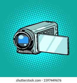 portable hand-held video camera. Pop art retro vector illustration kitsch vintage 50s 60s