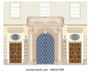 Portal of the house with ornate gates and balustrade
