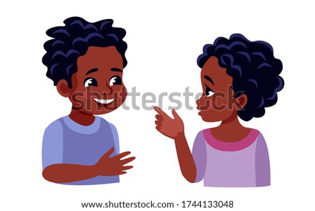 portrait of African children, they talk contentedly, gesticulate with their hands, a girl points a Polish boy