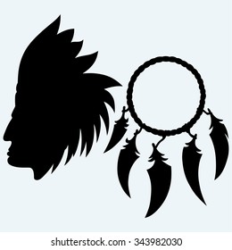 Portrait of american indian and dream catcher. Isolated on blue background. Vector silhouettes
