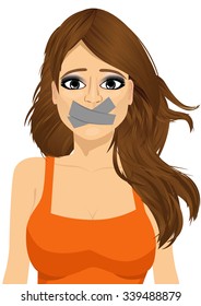 portrait of attractive brunette young woman silenced with mouth covered with grey tape