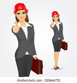 portrait of attractive engineer, entrepreneur or architect business woman with red helmet and briefcase giving thumbs up isolated over white background