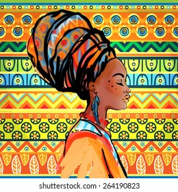 Portrait of beautiful African woman with earring (profile view) over ethnic style pattern