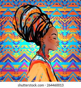 Portrait of beautiful African woman with earring (profile view) over ethnic style pattern